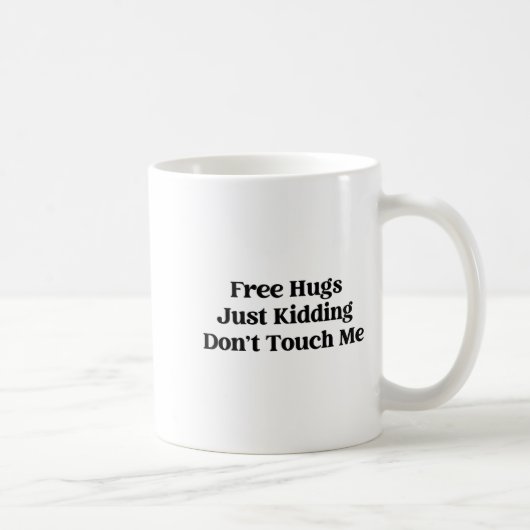 Hugs Just Kidding Don't Touch Me  コーヒーマグカップ (右)