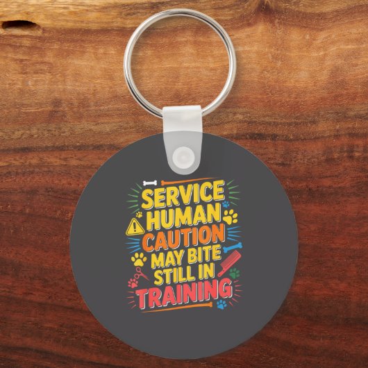 Human Caution Service May Still Bite Training Smil キーホルダー (正面)