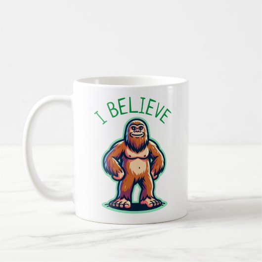 i信じサスカッチビグフット コーヒーマグカップ (左)