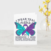 I衣服ティール（緑がかった色）と自殺防止戦争のための紫 カード (黄色い花)