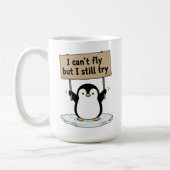 “I can’t fly but I still try” cute penguin コーヒーマグカップ (左)