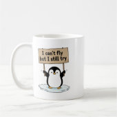 “I can’t fly but I still try” cute penguin コーヒーマグカップ (左)