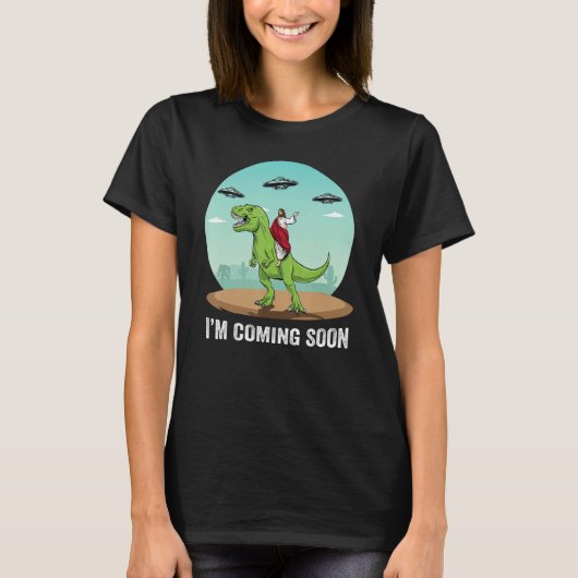 I m Coming Soon Jesus Riding On A Dinosaur UFO Ali Tシャツ (正面)