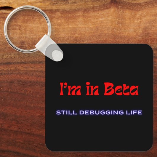 I’m in Beta – Still Debugging Life | Metal Keychai キーホルダー (正面)
