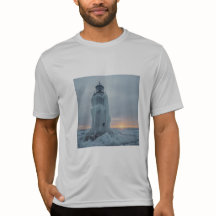 Ice covered coastal lighthouse