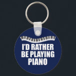 I'd Rather Be Playing Piano キーホルダー<br><div class="desc">I'd Rather be Playing Piano. A cool pianist gift for an accompanist featuring cute piano keys in a pretty wave above the funny words.</div>