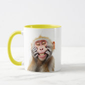 Image humoristique d'un singe farceur qui grimace. マグカップ (左)
