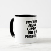 Immigrants Are Not Criminials But the President Is マグカップ (正面左)