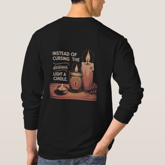 Instead of cursing the darkness, light a candle. tシャツ (裏面)