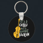 It's A Cello Not Giant Violin Funny Musician キーホルダー<br><div class="desc">Vintage retro orchestra music fan design for those playing string musical instrument in a music band or symphony. Cool classical music lover merchandise for cellist, musician and artist. Perfect for cello music teacher, orchestra fan and those who love to play cello or just love music. Great souvenir, Christmas gift and...</div>