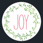 Joy Christmas Wreath Typography Quote Stickers ラウンドシール<br><div class="desc">緑の水色の花輪とエレガントな赤いフォントのJoyという単語を持つシンプルで綺麗なクリスマスステッカー。</div>