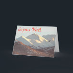 Joyeux Noё - Winter Eagle シーズンカード<br><div class="desc">ハゲのワシが、アンカレッジ近郊の雪に覆われたChugach Rangeの近くを飛ぶ。フランスの文字読の「Joyeux Noё」が赤で表示される。</div>