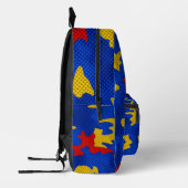 Kansas Blue Red Yellow Vibrant Camo Pattern プリントバックパック (左)