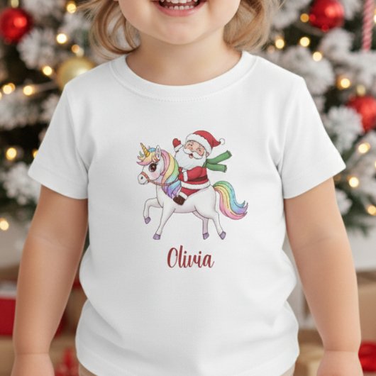 Kawaii Santa Claus Riding Rainbow Unicorn ベビーTシャツ