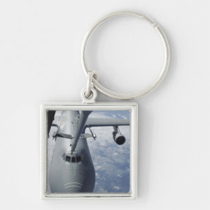KC-10エクステンダーはa.c. - 5 Galax --に燃料を補給することを準備します キーホルダー