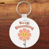 "Keep Blooming" レトロな笑顔のお花 キーホルダー (裏面)