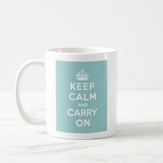 Keep Calm and Carry Onオンライトブルー コーヒーマグカップ (左)