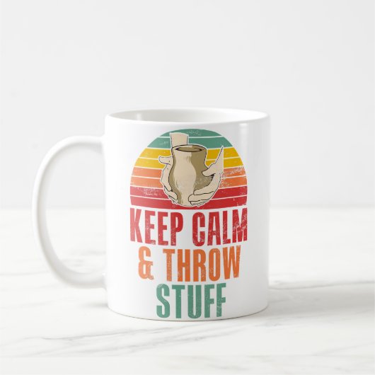 Keep Calm And Throw Stuff Funny Pottery コーヒーマグカップ (左)
