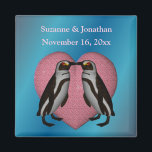 Kissing Penguins Cute Personalized Wedding  マグネット<br><div class="desc">A pair of cute kissing penguins on a pink heart against an electric blue background save the date announcement or wedding favor refrigerator magnet. Fill in your information in the template. Make more changes to text and font size, style, and color. This design is available on many products in my...</div>