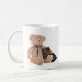 kitten in the arms of a teddy bear コーヒーマグカップ (左)