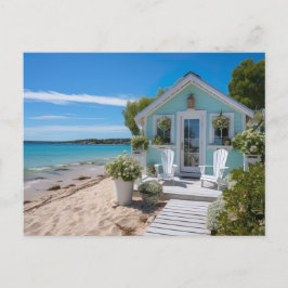 kleines mintfarbenes Strandhaus am Meer ポストカード