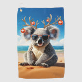 Koala on beach wearing Antlers and baubles ゴルフタオル (正面)