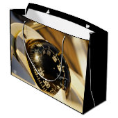 Kompas helpt navigeren en koer behouden.  ラージペーパーバッグ (裏面アングル)