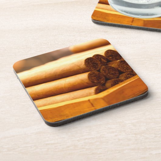 LaのRomanaの先生からの手によって転がられるシガー コースター (左側)