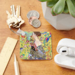 Lady with Fan by Gustav Klimt, Vintage Japonism キーホルダー<br><div class="desc">Lady with Fan (1918) by Gustav Klimt is a vintage Victorian Era Symbolism fine art portrait painting. A beautiful brunette woman holding an oriental fan. The golden floral Japanese themed background is full of blooming exotic flowers, peacocks and other birds with outstretched wings. About the artist: Gustav Klimt (1862-1918) was...</div>