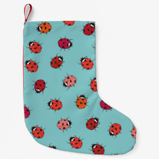 Ladybugs、青い背景、シームレス魅力的なパターン スモールクリスマスストッキング