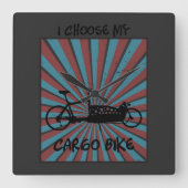 Lastenrad im Auge mit Strahlen und Spruch スクエア壁時計 (正面)