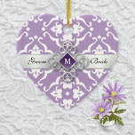 Lavender Lily Damask Wedding Momento セラミックオーナメント<br><div class="desc">A lavender floral damask heart shaped wedding ornament as a memento from your special day with a silver ribbon and graphic representation of an amethyst jewel. Personalize front and back with your wedding date,  along with Groom and Bride's name.</div>