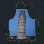 Leaning Tower at Dusk エプロン<br><div class="desc">This captivating photograph showcases the iconic Leaning Tower of Pisa standing elegantly against a deep blue twilight sky in Pisa. The historic marble tower, famous for its unmistakable tilt, is beautifully illuminated, highlighting its intricate Romanesque arches and layered columns. The soft evening light creates a striking contrast between the glowing...</div>