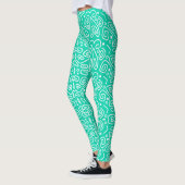 Leggings verde con líneas blancas redondeadas レギンス (左)