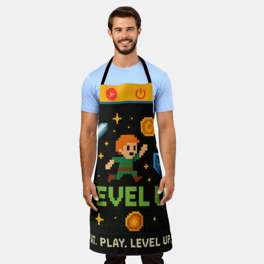Level Up Gamer Apron – Retro Pixel All-Over Print エプロン (着用した状態)