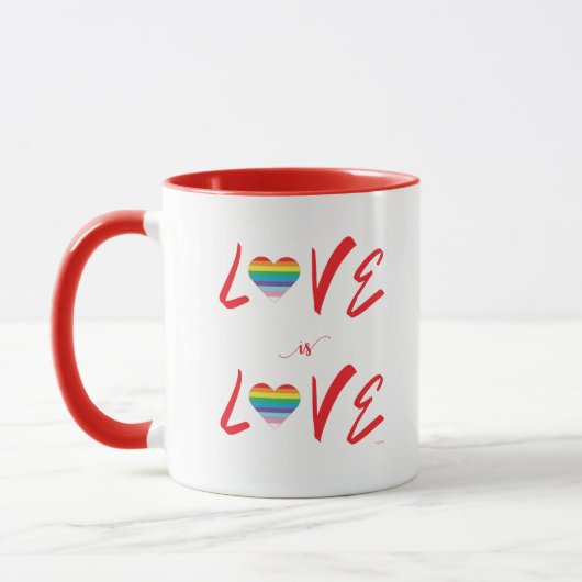 LGBTQIA LOVE is LOVEレインボーハートプライド旗 マグカップ (左)