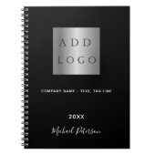 Logo de empresa em preto e branco com nome em scri ノートブック (正面)