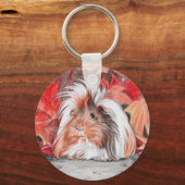Long haired guinea pig in autumn キーホルダー (正面)