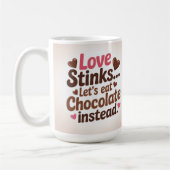 Love stinks let's eat chocolate instead  コーヒーマグカップ (左)