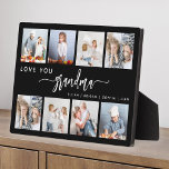 Love You Grandma 8 Photo Collage Black フォトプラーク<br><div class="desc">Give Grandma a gift she'll cherish. This photo collage plaque features eight of her favorite square photos of the grandkids, along with the message "Love You Grandma." The word "grandma" appears in elegant white handwriting script with flourishes at the beginning and end on a black background. Add the names of...</div>