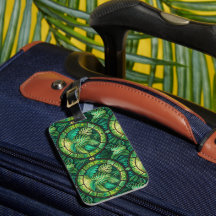 Luggage tag with a tropical leaf pattern