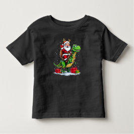 Lustiger Weihnachtsmann auf Dino mit Lichterkette トドラーTシャツ