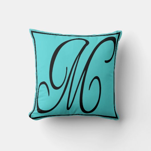 M PILLOW – アクアバックグラウンドの文字M クッション (正面)