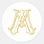 MAまたはAM Monogramの金ゴールド ラウンドシール (正面)