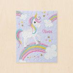 Magical Rainbow Unicorn Purple Personalized Kids ジグソーパズル<br><div class="desc">A cute purple unicorn jigsaw puzzle for kids with stars and a rainbow. Personalize with her name to make a fun gift for a girl!</div>