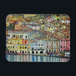 Malcesine on Lake Garda By Gustav Klimt マグネット<br><div class="desc">Malcesine on Lake Garda (1913) by Gustav Klimt is a vintage Victorian Era Art Nouveau fine art symbolism painting. A beautiful view of the Italian city of Malcesine with buildings and houses on the edge of the harbor. The homes and boats cast a reflection in the calm water. You can...</div>