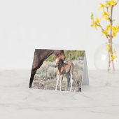 Mare and foal standing together in the sunshine カード (黄色い花)