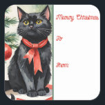 Meowy Christmas Kitten with a bow Holiday Giftラベル スクエアシール<br><div class="desc">ステッカーギフトラベルへ魅力的と、このデザインはヴィンテージオーナメントの球根で飾られた美しいクリスマスツリーの横に置かれたフェスティバルの赤い弓を着て、魅力的な黄色の目を持つ愛らしい黒い子猫の楽しい水色のイラストレーションを特徴とす飾る。</div>