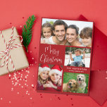 Merry Christmas 4 Photo Red シーズンカード<br><div class="desc">Simple red photo collage holiday card. "Merry Christmas" is written in a stylish white script and you can personalize with 4 photos and your family name and the year in modern white typography.</div>