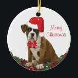 Merry Christmas Cute Dog Xmas Santa Hat Festive セラミックオーナメント<br><div class="desc">Adorable Boxer puppy with a Santa hat and christmas reef ornament. Digital painting by Inge Lewis. Find more matching items at the ingeinc.com store. Find more matching items at the ingeinc.com store.</div>